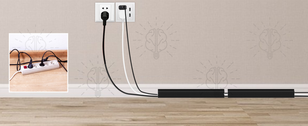 Sticky cable zipper organiser hiding a power strip cable running from a wall outlet, keeping wires concealed and the setup clean and clutter-free.